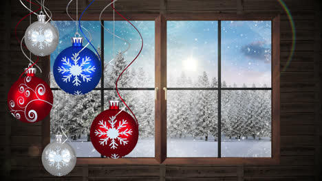 Animation-of-red,-blue-and-silver-baubles-hanging-with-winter-scenery