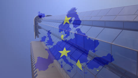 Bandera-De-La-UE-Sobre-El-Mapa-De-La-UE-Contra-Un-Edificio-Alto