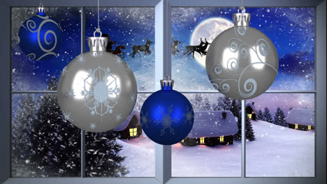 Digital-animation-of-bauble-decorations-hanging-on-window-frame-against-snow-falling-over-silhouette