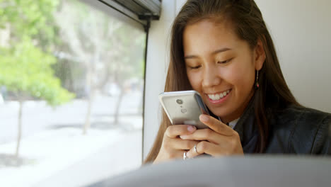 Teenage-girl-using-mobile-phone-4k