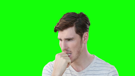 Worried-Caucasian-man-on-green-background