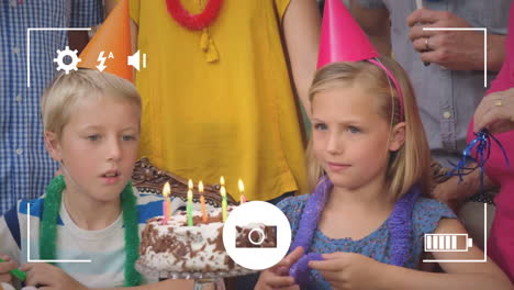 Taking-photos-of-children-at-birthday-party-on-a-digital-camera