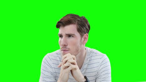 Worried-Caucasian-man-on-green-background