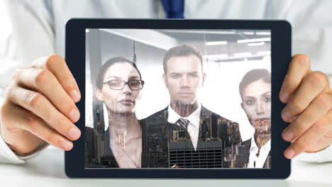 Tablet-showing-Businesspeople-video