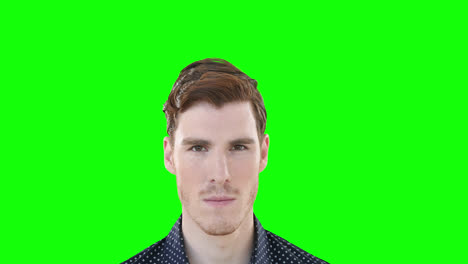 Man-smiling-against-green-screen-background