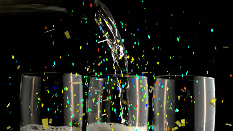 Animation-of-multi-coloured-confetti-falling-over-pouring-champagne