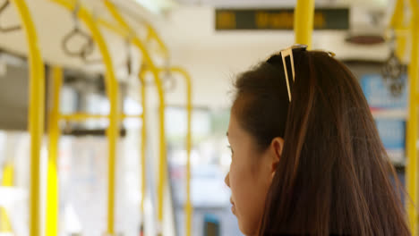 Teenage-girl-travelling-in-the-bus-4k