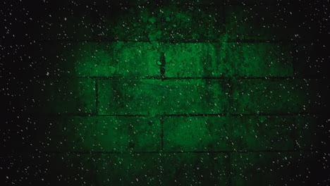 Animation-of-winter-scenery-snow-falling-against-green-brick-wall