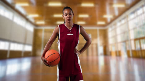 Female-basketball-player-against-basketball-court-in-background