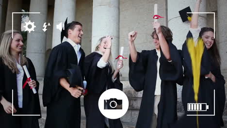 Taking-photos-of-students-graduating-on-a-digital-camera