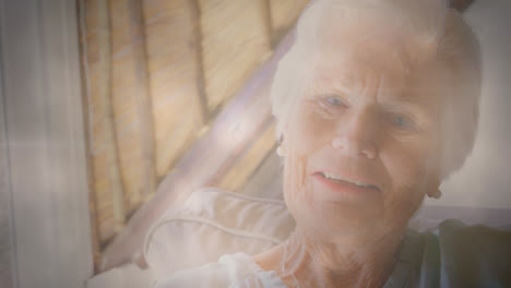 Animation-Von-Leuchtendem-Licht-über-Dem-Porträt-Einer-Glücklichen-älteren-Frau