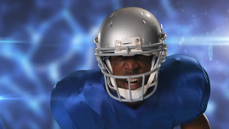 Animation-of-american-football-player-in-helmet-over-blue-glowing-background