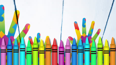 Animation-of-colourful-crayons-over-hands-formed-with-puzzles
