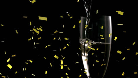 Animation-Von-Konfetti,-Das-über-Ein-Champagnerglas-Auf-Schwarzem-Hintergrund-Fällt