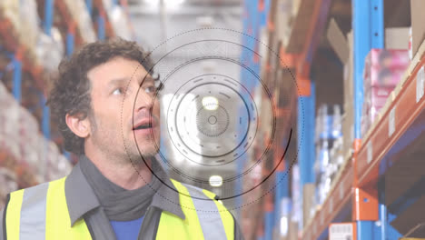 Animation-of-scope-scanning-over-man-working-in-warehouse