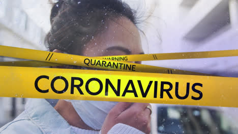 Animation-of-coronavirus-text-on-hazard-tape-over-woman-in-face-mask-coughing-in-street