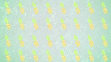 Animation-of-pineapples-moving-on-green-background
