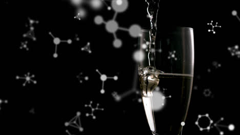 Animation-of-networks-floating-over-champagne-glass-on-black-background