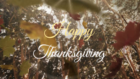 Happy-thanksgiving-text-over-multiple-maple-leaves-falling-against-forest-in-background