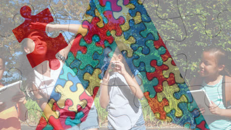 Animation-of-colorful-puzzle-pieces-over-happy-playing-children