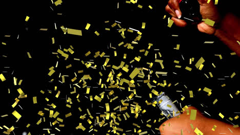 Animation-of-confetti-over-man-opening-champagne-on-black-background
