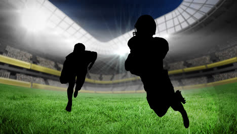 Animation-of-silhouettes-of-american-football-players-over-sports-stadium