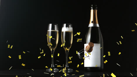 Animation-of-gold-confetti-and-cork-falling-over-champagne-bottle-and-glasses-on-black-background