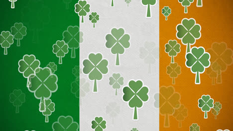 Digital-animation-of-multiple-clover-leaves-floating-against-irish-flag