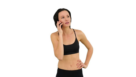 Fit-brunette-talking-on-the-phone