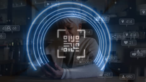 Animation-of-qr-code-over-woman-using-smartphone
