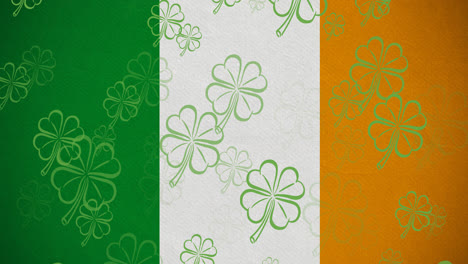 Digital-animation-of-multiple-clover-leaves-floating-against-irish-flag