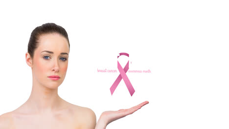 Animation-of-pink-ribbon-logo-with-breast-cancer-text-over-young-woman