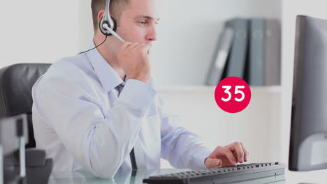 Animation-of-numbers-changing-over-businessman-wearing-phone-headset