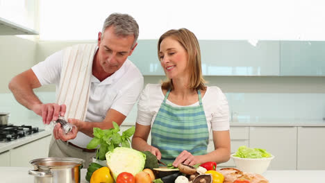 Mature-couple-making-dinner-together