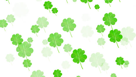 Digital-animation-of-multiple-clover-leaves-floating-against-white-background