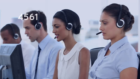 Animation-of-numbers-changing-over-business-people-wearing-phone-headsets