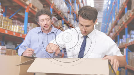 Animation-of-scope-scanning-over-men-working-in-warehouse