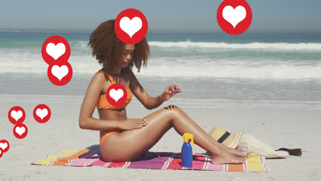 Animation-Von-Digitalen-Symbolen-Mit-Roten-Herzen-über-Einer-Frau,-Die-Am-Strand-Sonnencreme-Aufträgt