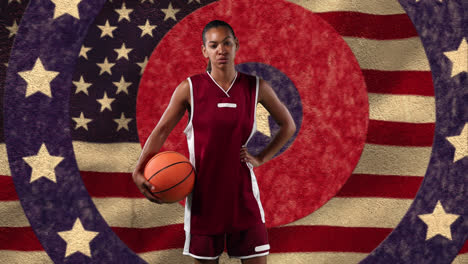 Female-basketball-player-holding-a-ball-against-stars-on-spinning-circles-and-waving-american-flag