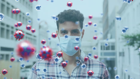 Animation-of-covid-19-virus-cells-over-man-wearing-face-mask
