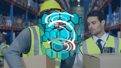 Hexagonal-shape-spinning-against-caucasian-male-worker-and-supervisor-discussing-at-warehouse