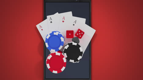 Animation-of-casino-chips,-dice-and-playing-cards-over-smartphone