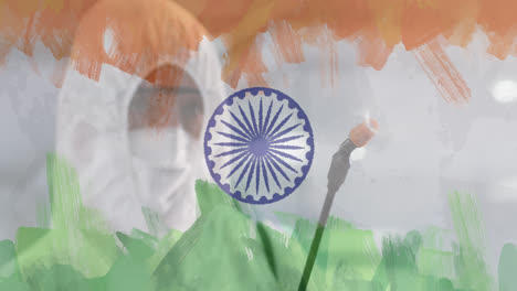 Animation-of-worker-in-ppe-suit-disinfecting-office-over-indian-flag