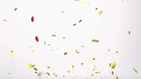 Animation-of-falling-colourful-pills-and-confetti,-on-white-background