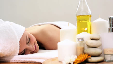 Peaceful-woman-relaxing-on-the-massage-table