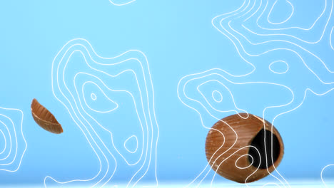 Animation-of-contour-lines-moving-over-chocolate-easter-egg-falling-and-breaking,-on-blue