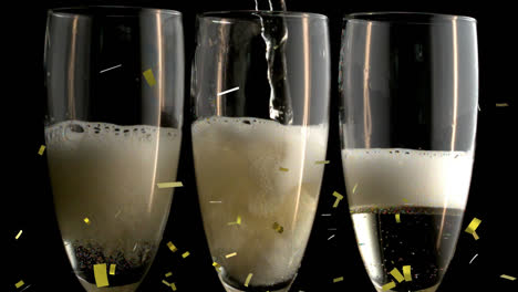 Animation-of-confetti-falling-over-champagne-glasses-on-black-background