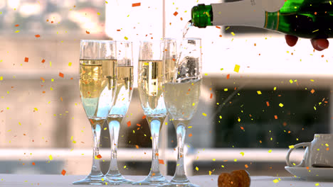 Animation-of-confetti-falling-over-champagne-glasses-on-table