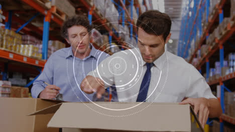 Animation-of-scope-scanning-over-men-working-in-warehouse