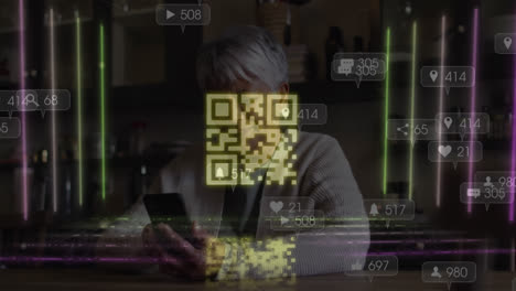 Animation-of-qr-code-over-woman-using-smartphone